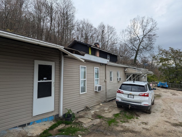 view of home's exterior featuring cooling unit