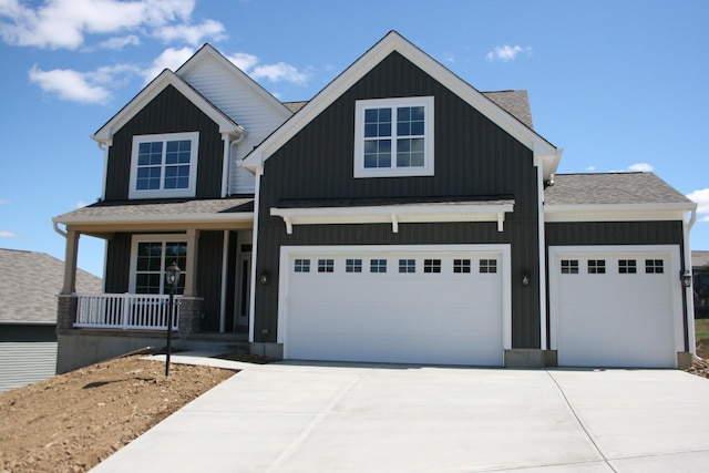 craftsman inspired home featuring covered porch