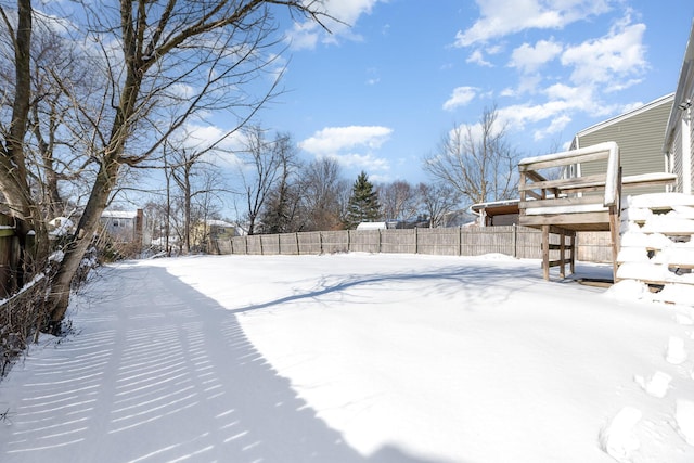 view of yard covered in snow