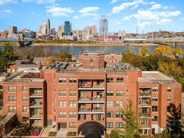 property's view of city featuring a water view