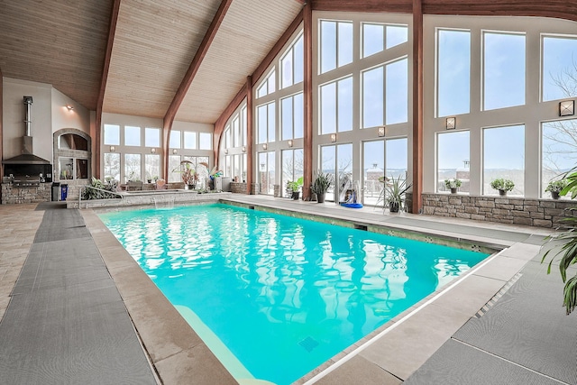 view of pool with a fireplace