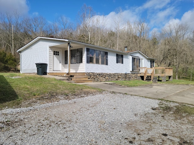 manufactured / mobile home featuring a deck