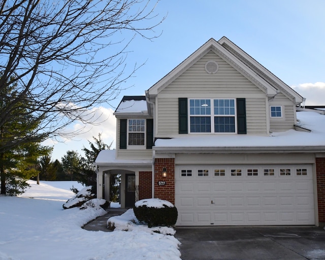 front of property featuring a garage