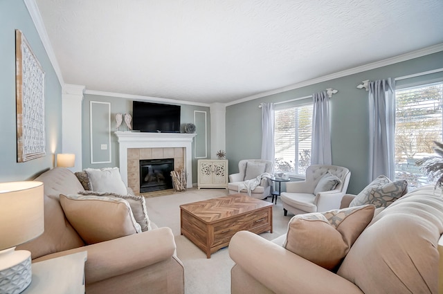 carpeted living room with a textured ceiling, ornamental molding, and a fireplace