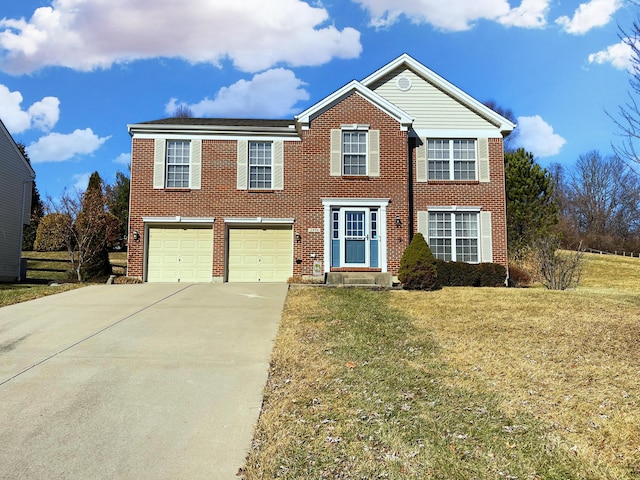 view of front of property featuring a garage and a front yard