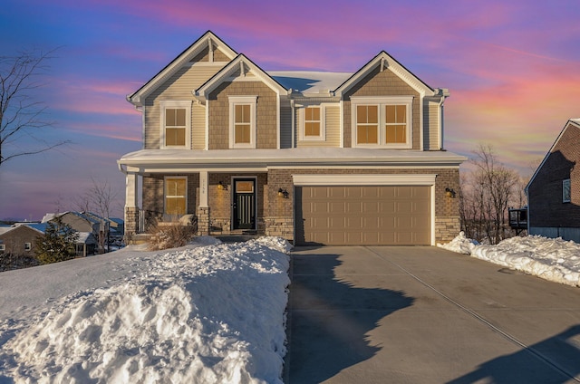 craftsman-style house featuring a garage