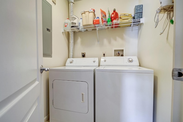 washroom featuring washer and clothes dryer