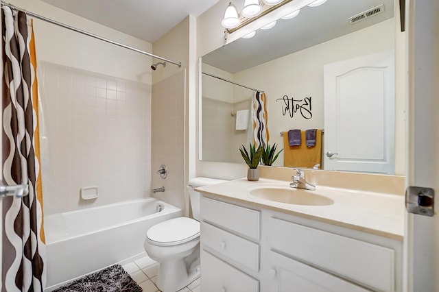 full bathroom with tile patterned floors, vanity, shower / bath combo, and toilet