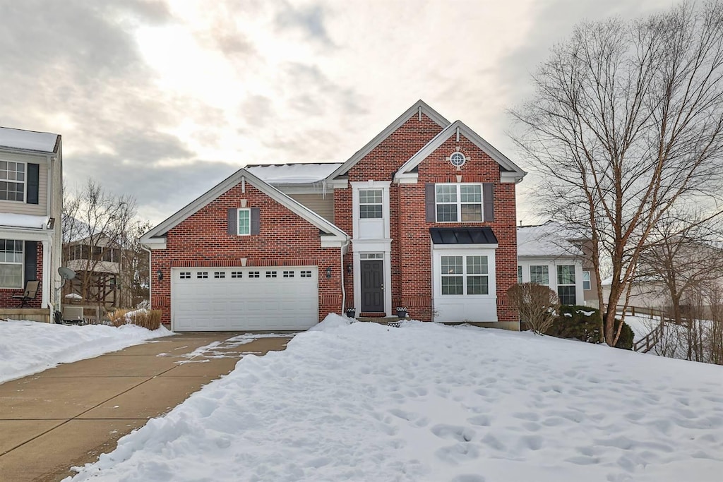 front of property with a garage