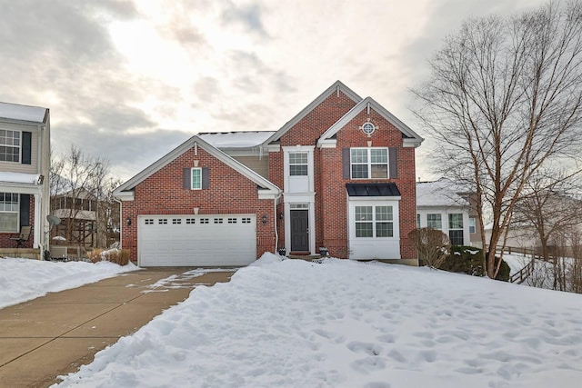 front of property with a garage