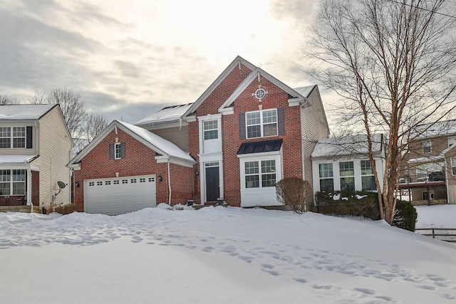 front facade with a garage