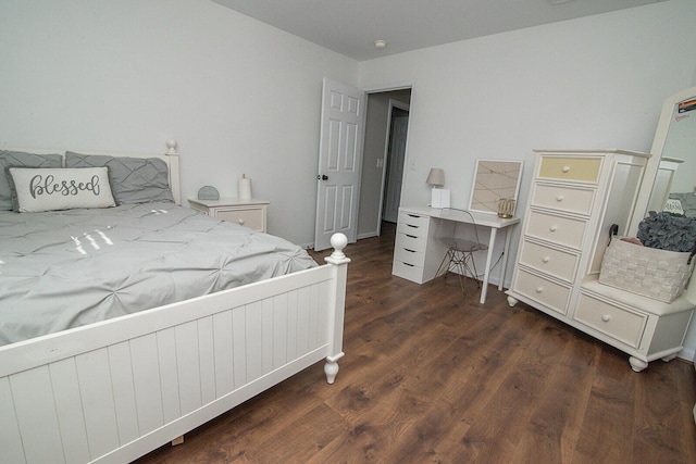 bedroom featuring dark wood-type flooring