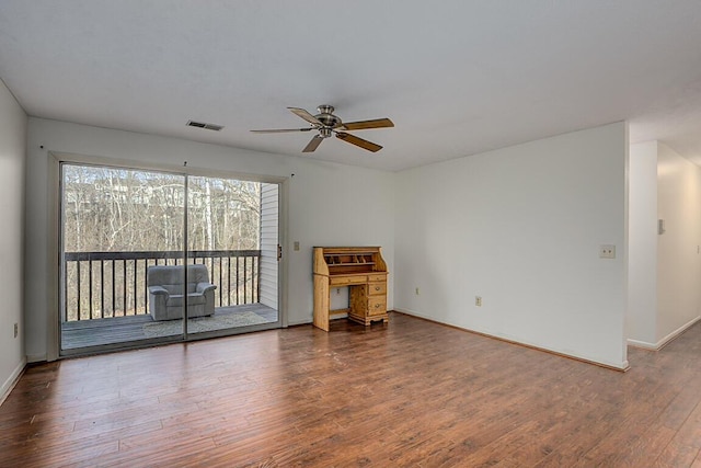 unfurnished living room with ceiling fan and hardwood / wood-style flooring