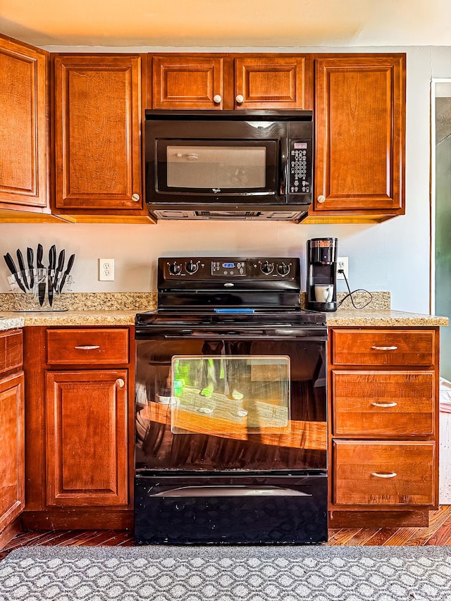 kitchen with black appliances