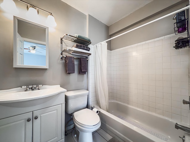 full bathroom featuring vanity, shower / bathtub combination with curtain, and toilet