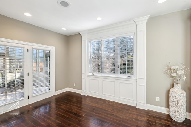 interior space featuring a healthy amount of sunlight and dark wood-type flooring