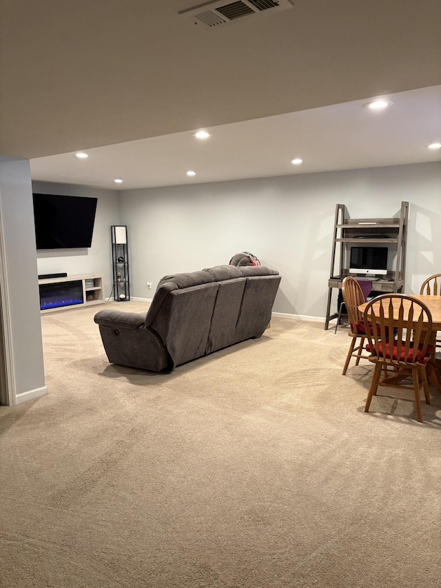 living room with light colored carpet