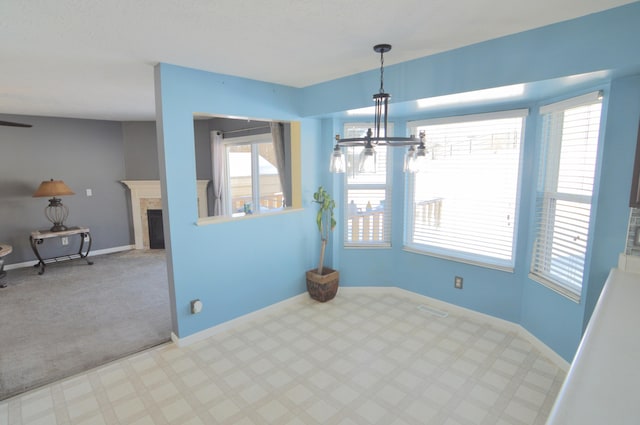 dining room featuring light colored carpet