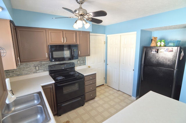 kitchen with sink, backsplash, ceiling fan, and black appliances