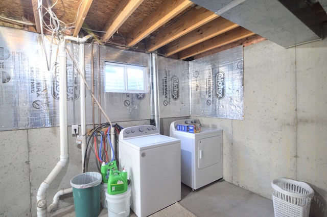 washroom featuring independent washer and dryer