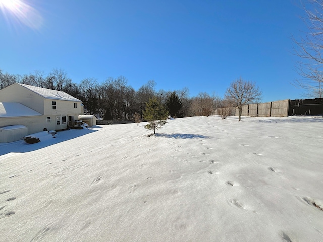 view of yard covered in snow