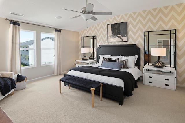 carpeted bedroom with ceiling fan