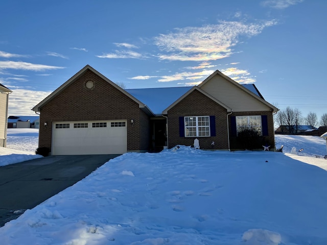 ranch-style home featuring a garage