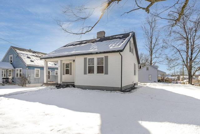 bungalow-style home featuring covered porch