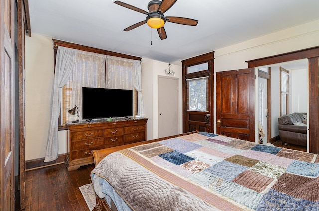 bedroom featuring dark hardwood / wood-style flooring and ceiling fan