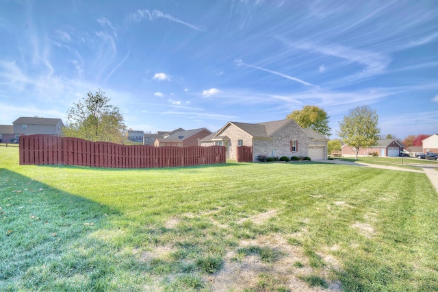 view of yard with a garage