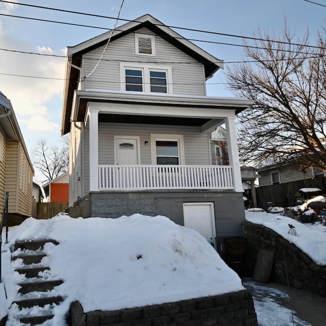 view of property with a porch