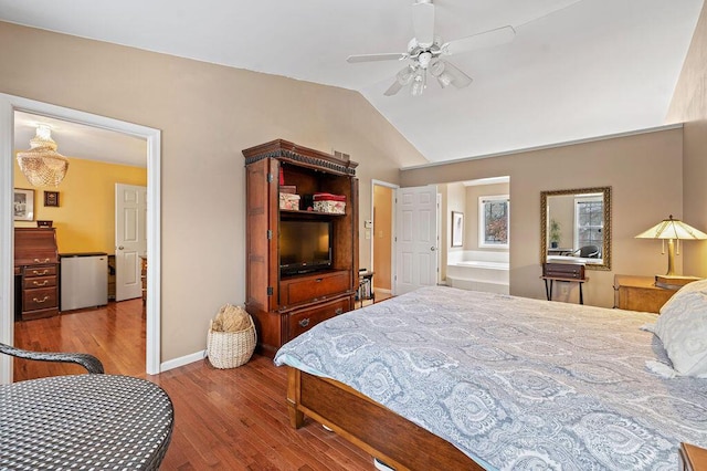 bedroom featuring fridge, ceiling fan, light hardwood / wood-style floors, and vaulted ceiling