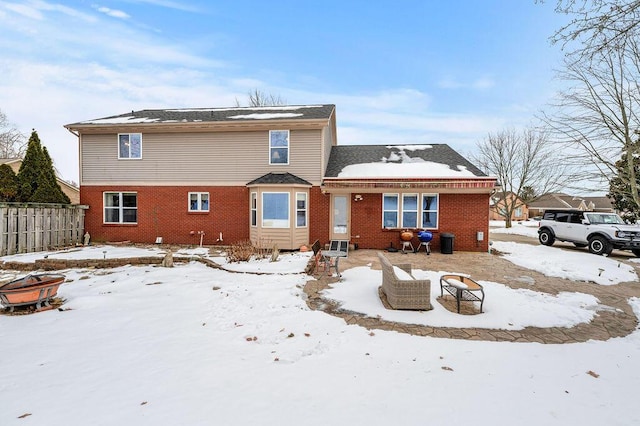 view of snow covered property