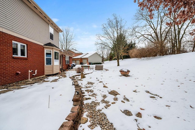 view of yard covered in snow