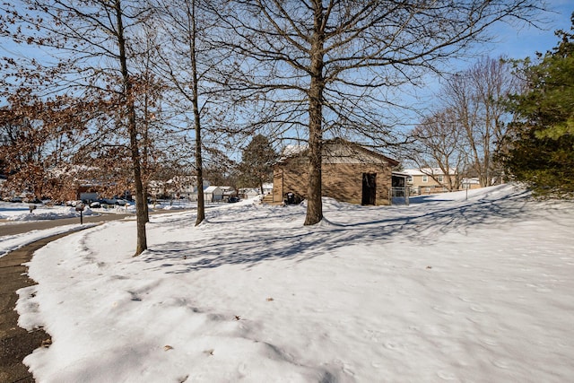 view of yard covered in snow