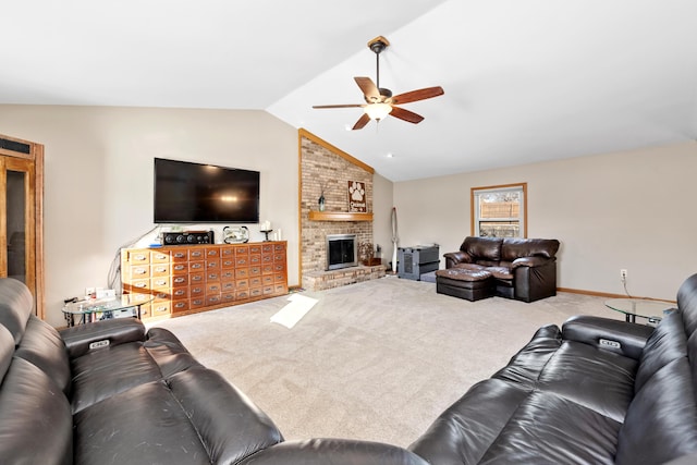 living room featuring ceiling fan, carpet, vaulted ceiling, and a fireplace