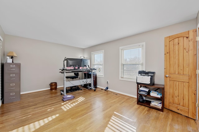 office area with hardwood / wood-style floors