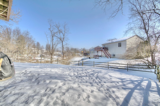 view of yard covered in snow