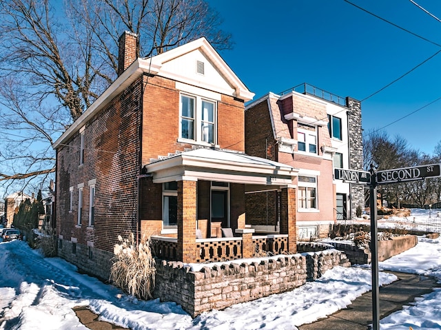 front of property featuring a porch