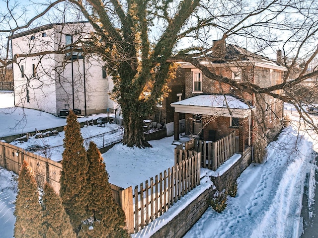 view of yard covered in snow