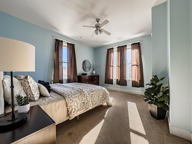 bedroom featuring ceiling fan and carpet flooring