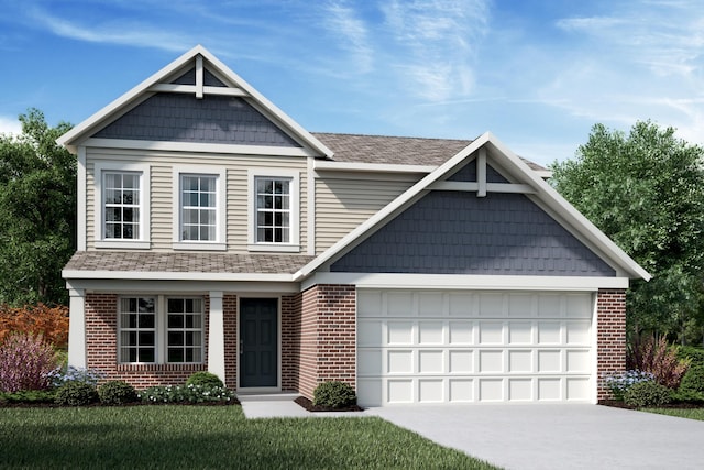 view of front of house featuring a front yard and a garage