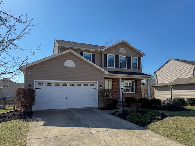 traditional-style home featuring brick siding, an attached garage, concrete driveway, and a front lawn