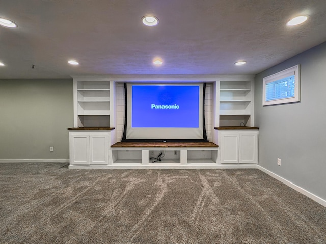 carpeted home theater room featuring recessed lighting and baseboards