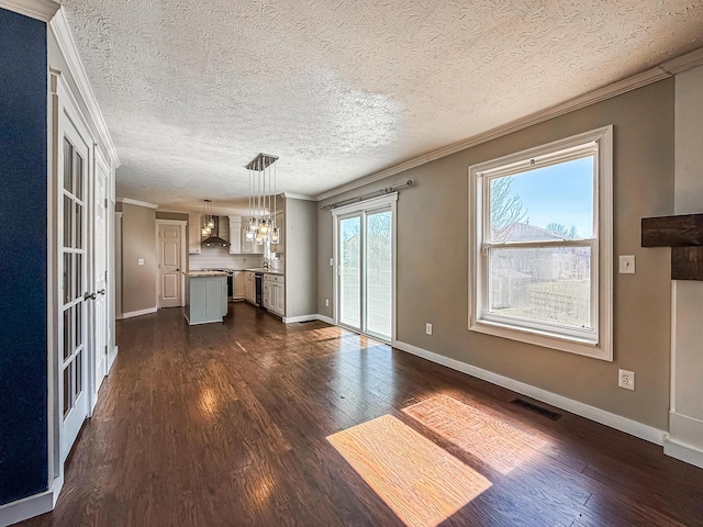 unfurnished living room with crown molding, dark wood-style floors, visible vents, and baseboards