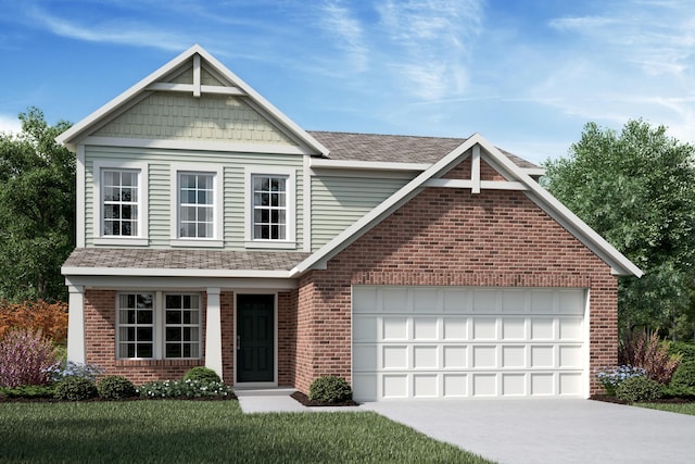 view of front of property with a garage and a front lawn