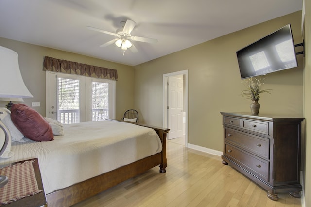 bedroom featuring light wood-type flooring, ceiling fan, and access to exterior