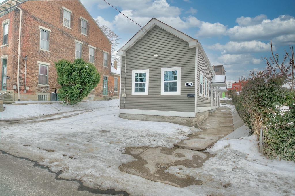 view of property exterior with central AC unit