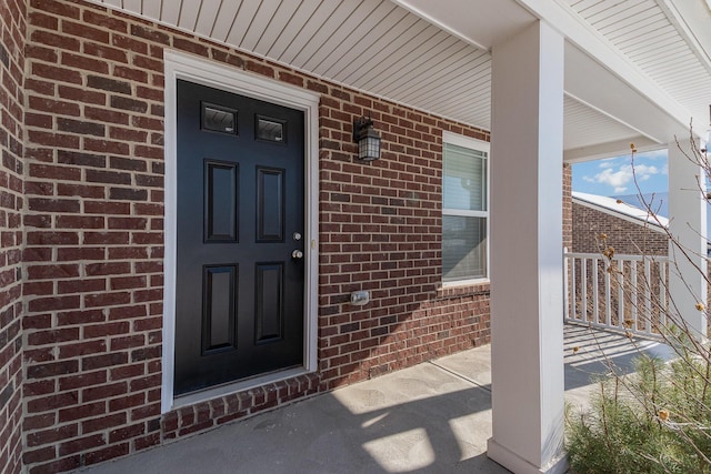 doorway to property featuring a porch