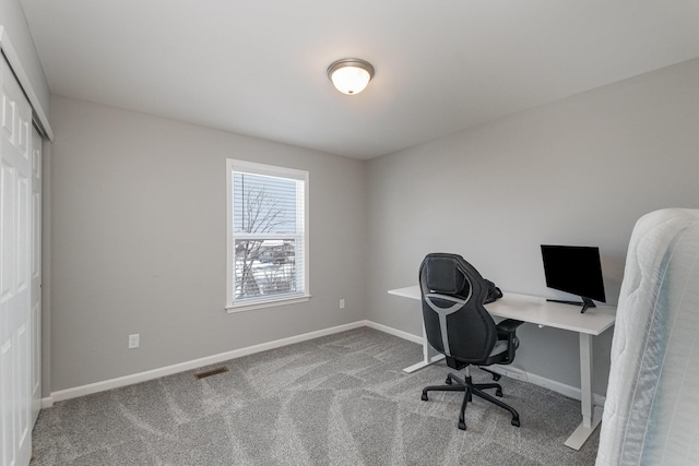 view of carpeted office space